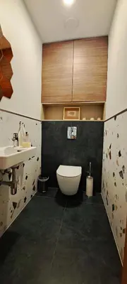a bathroom with a toilet and a sink at White house in Vilnius in Vilnius