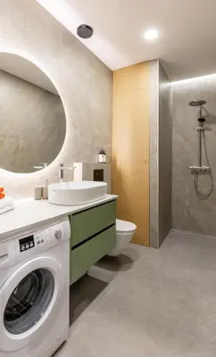 a bathroom with a washing machine and a sink at Nordic Apartment in Kaunas Old Town Area and Balcony in Kaunas