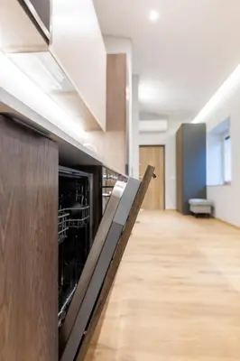 an empty room with a row of wine racks at Nordic Apartment in Kaunas Old Town Area and Balcony in Kaunas