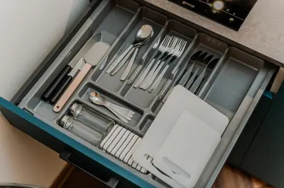 a drawer full of utensils in a kitchen at Chamber Luxury House in Kaunas