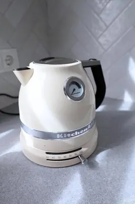 a toaster sitting on top of a kitchen counter at Apartamentai Šiaulių miesto centre in Šiauliai