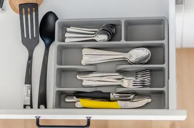 a drawer filled with utensils and utensils sidx sidx sidx sidx sidx at Šopeno Butas Cozy Quiet and Well-Located 5 in Vilnius