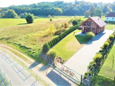 an aerial view of a house in a field at Pas Rimute in Zapyškis