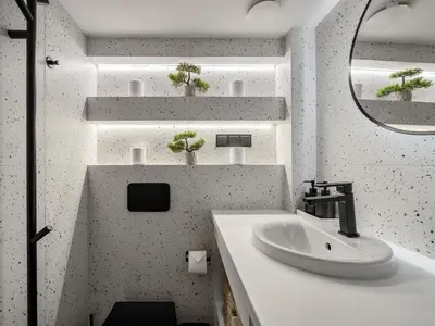 a bathroom with a sink and a mirror at 8 Loft in Vilnius