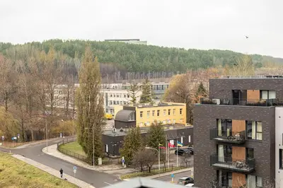 an aerial view of a city with buildings and a street at Spacious and Modern Apartment with Free Parking in Vilnius