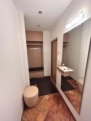 a bathroom with a toilet and a sink at Lina in Vilnius