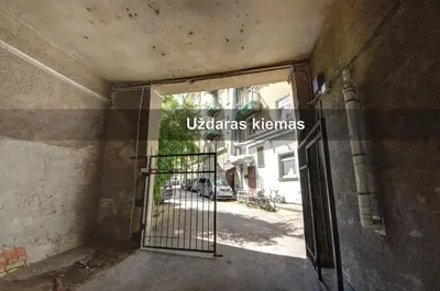 an entrance to a building with an open door at Vilnius Central Apartment Free Parking in Vilnius