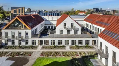 an aerial view of a building with red roofs at Cozy one bedroom apartment in Vilnius Old Town in Vilnius