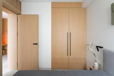 a room with wooden cabinets in a room at Cozy one bedroom apartment in Vilnius Old Town in Vilnius