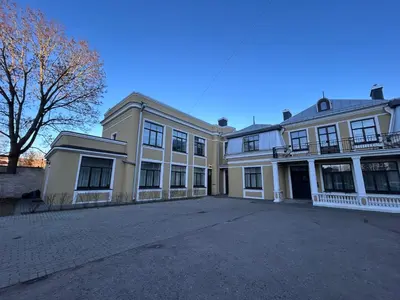 a large white building with a lot of windows at Vydūno apartamentai 5 in Kaunas