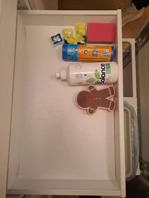 a white refrigerator with some items in it at Vydūno apartamentai 5 in Kaunas