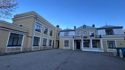 a large white building with a lot of windows at Vydūno apartamentai in Kaunas