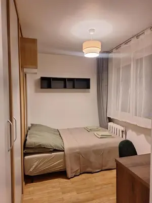 a bedroom with a bed in a room at Konarskio 3 kambarių butas in Vilnius