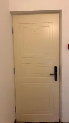a garage door with a handle on it at Vydūno apartamentai 12 in Kaunas