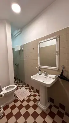 a bathroom with a sink and a toilet at Vyduno apartments 7 in Kaunas