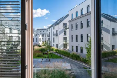 a view from the window of a building at Modern cozy apartment with free parking in trendy Paupys in Vilnius