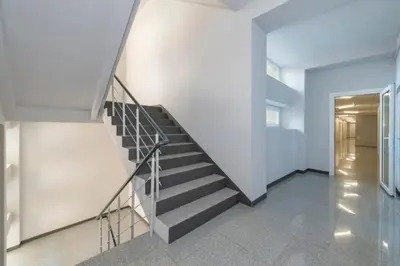a staircase in a building with a stair case at Stay in Kaunas LA51A Standard - Free Parking in Kaunas