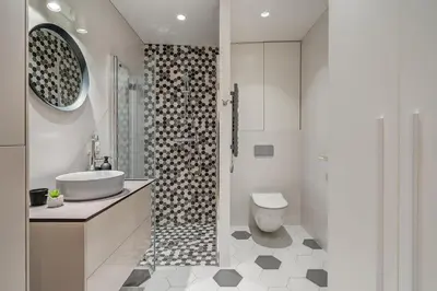 a bathroom with a toilet and a sink and a shower at Center Apartment near Hillton with self check-in in Vilnius