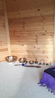 a stove with three bowls on it in a room at namelis tyloje in Šarkiškės