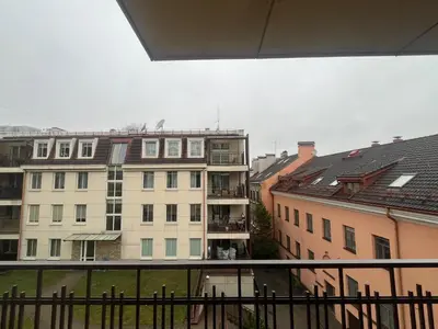a view of a building from a balcony at V13 Apartment in Old Town in Vilnius