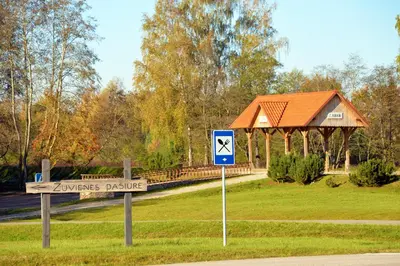 a street sign in front of a gazebo at Žuvienės Pašiūrė in Rubikiai