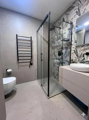 a bathroom with a shower and a toilet and a sink at New Cozy Designer Apartment in Uzupis Walk to Old Town in a Luxury Building Garden View Balcony in Vilnius