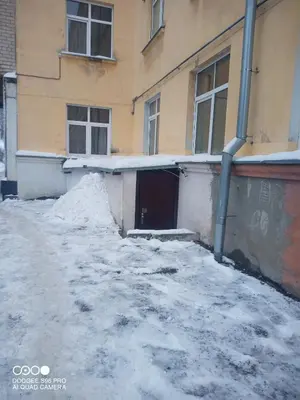 a pile of snow in front of a building at Frankes Cozy One Bedroom Apartment in Vilnius