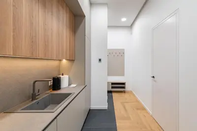 a kitchen with a sink and a counter at Vytauto 43 Residence 9 by Domvia in Kaunas