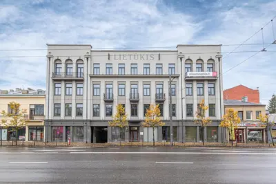 a large white building on the side of a street at Vytauto 43 Residence 9 by Domvia in Kaunas