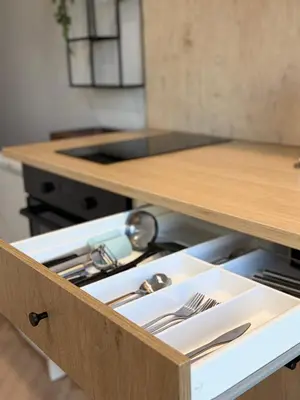 a box with utensils in it in a kitchen at Central Svitrigaila Apartments in Vilnius