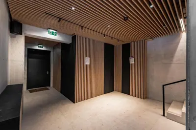 an empty room with a door in a building at Modern Apartment next to Kaunas Clinics in Kaunas