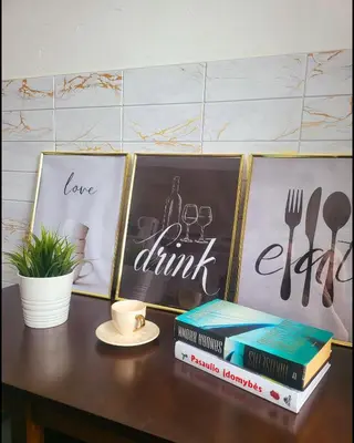 two books sitting on top of a table with pictures at Mocha House 2-Bedroom Apartment Netflix Speedy Wifi in Kaunas
