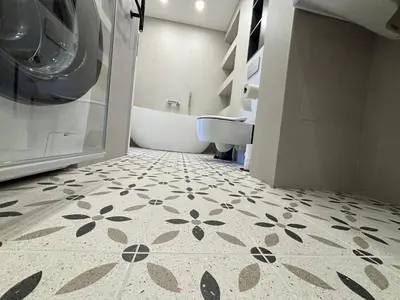 a bathroom with a tub and a sink and a washing machine at Exclusive 2 Bedroom Apartment Trendy City Center, Large Terrace & Free Parking in Vilnius