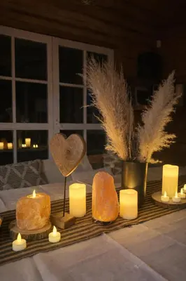 a table with bread and candles and a heart at Privatus namelis gamtoje greta Trakų in Daugirdiškės