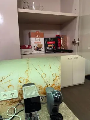 a kitchen with a mess on the wall of a room at Kęstučio 66 apartamentai in Kaunas