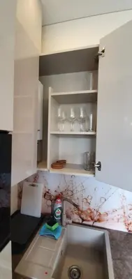 a kitchen with a sink and a counter top at Kęstučio 66 apartamentai in Kaunas