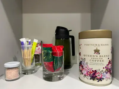 a counter top with a jar of christmas break coming together at Studio between two stations in Šiauliai