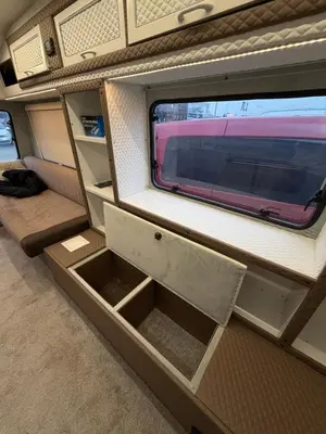 an interior of an rv with drawers and a window at PaRina in Vilnius