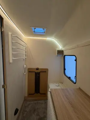 a small room with a toilet and a window at PaRina in Vilnius