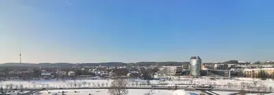 a view of a city in the snow at Vilnius Gate Skyline Studio in Vilnius