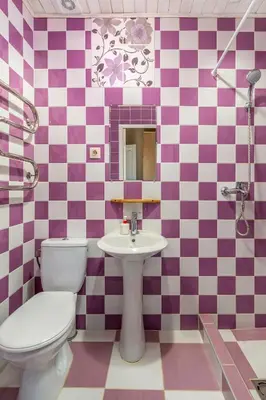 a bathroom with a toilet and a sink at Vila Sanzila in Bernatoniai