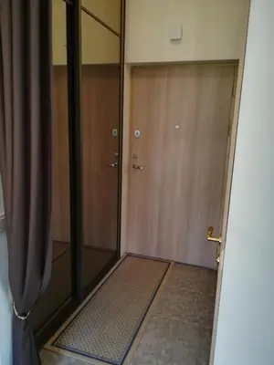 a room with a glass door and a door at Apartment Vilnius Old Town in Vilnius