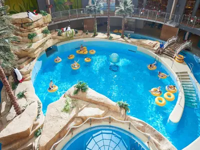 an overhead view of a water slide at a theme park at Aqua Center Apartments in Druskininkai