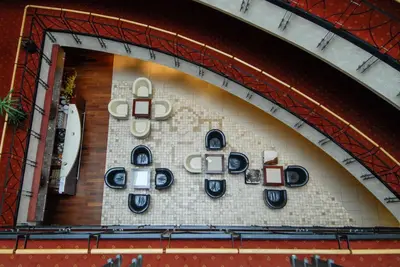 a wall with a bunch of plates on it at Royal SPA Residence in Birštonas
