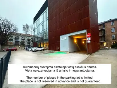 a sign is posted in front of a building at VICTORIA Hotel Kaunas in Kaunas