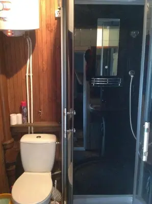 a bathroom with a toilet and a shower at 