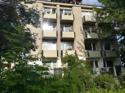 an apartment building with balconies on the side of it at Apartment Vilnius Zemaitijos in Vilnius