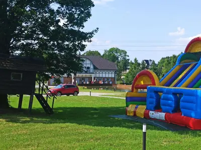 a group of playground equipment in a park at Auroradream in Motiejiškės