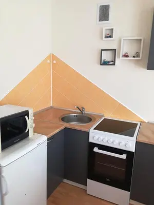 a small kitchen with a sink and a stove at Apartment for rent Druskininkai in Druskininkai