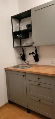 a kitchen with a sink and a counter top at Apartments with outdoor SPA jacuzzi and sauna in Vilnius